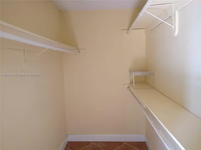 a view of small space with racks on the wall