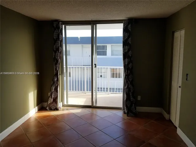 a view of a room with an empty room