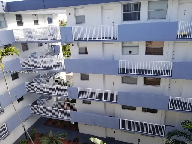 a view of roof deck with patio
