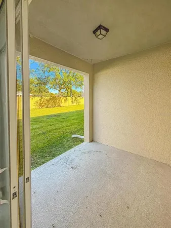 a view of a big room with an outdoor space