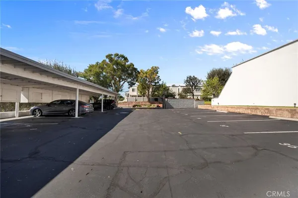 a view of street with parked cars