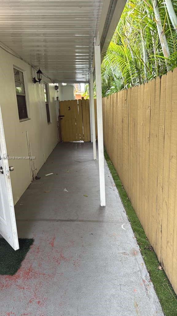 7230 Northwest 3rd Street, Unit 4 Miami, FL 33126 - Photo 2 of 13 a view of a back yard of the house