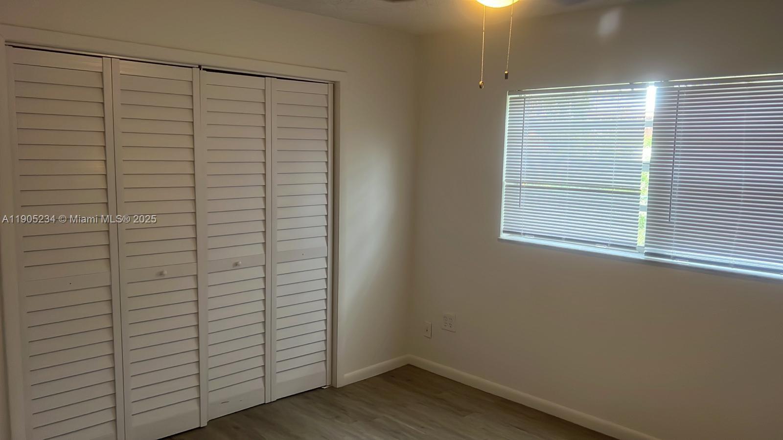 7230 Northwest 3rd Street, Unit 4 Miami, FL 33126 - Photo 8 of 13 a bathroom with a window