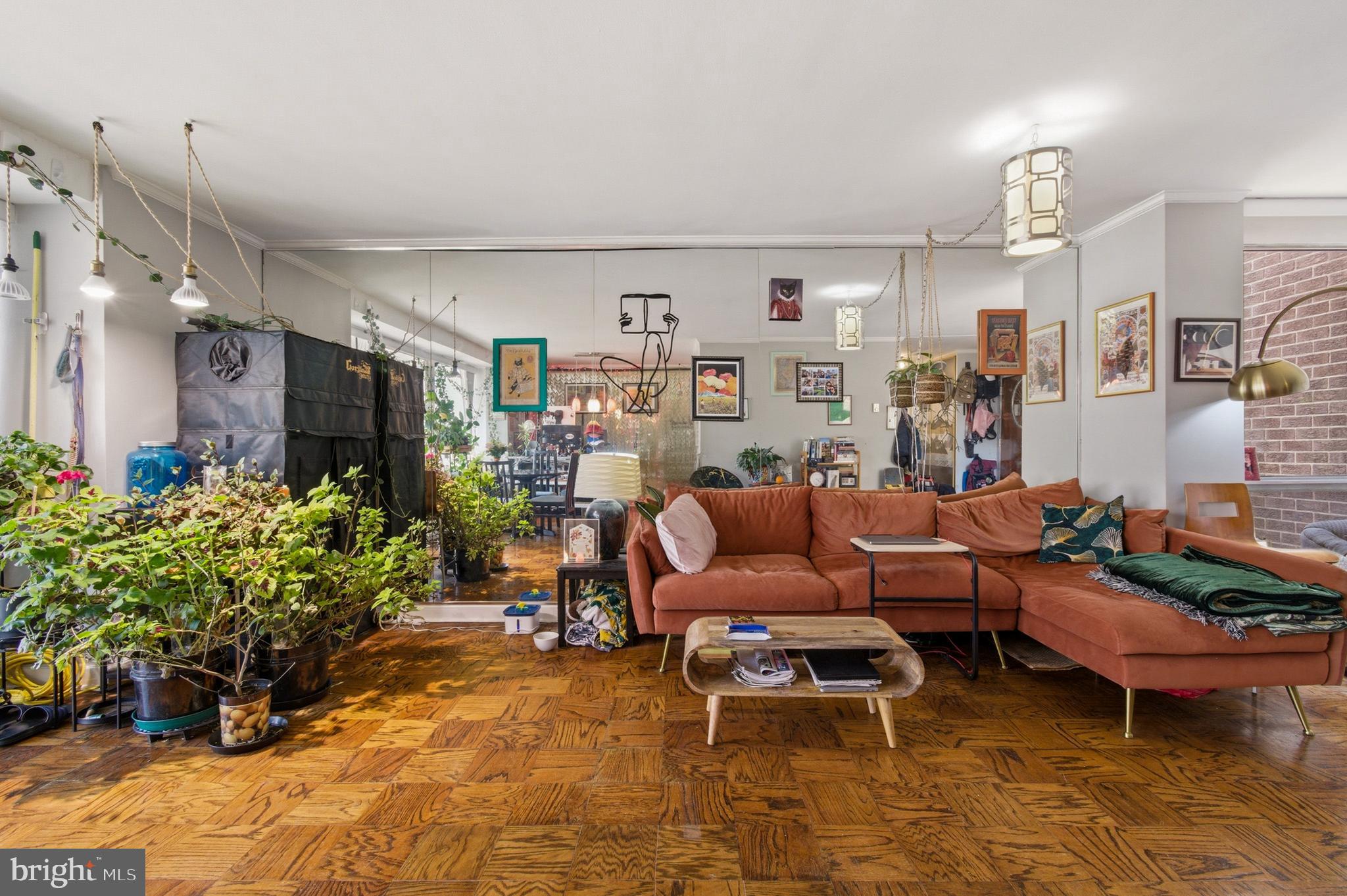 400 O Street Southwest, Unit 402 Washington, DC 20024 - Photo 13 of 34 a living room with lots of furniture and a painting on the wall