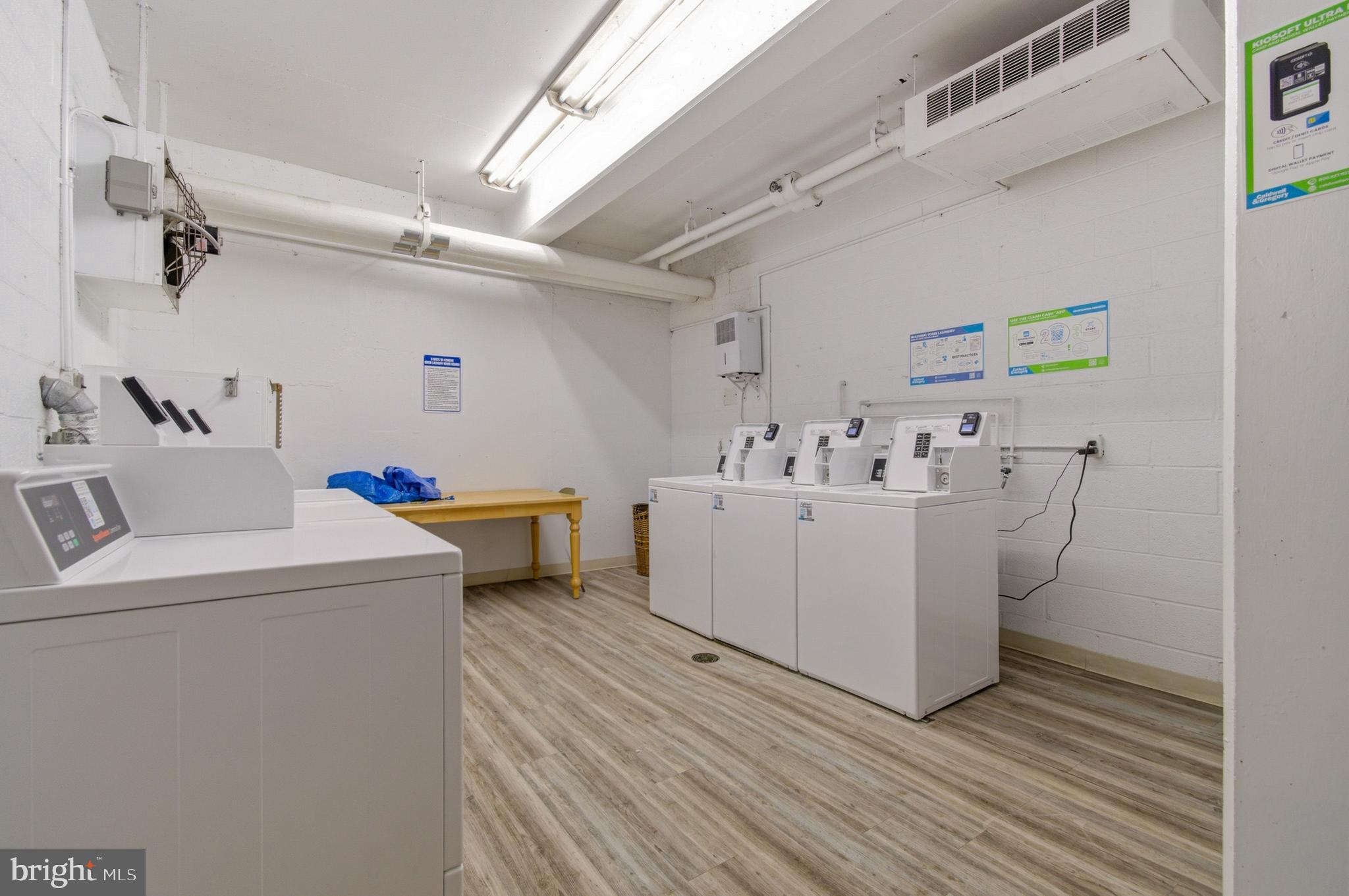 400 O Street Southwest, Unit 402 Washington, DC 20024 - Photo 34 of 34 a utility room with washer and dryer