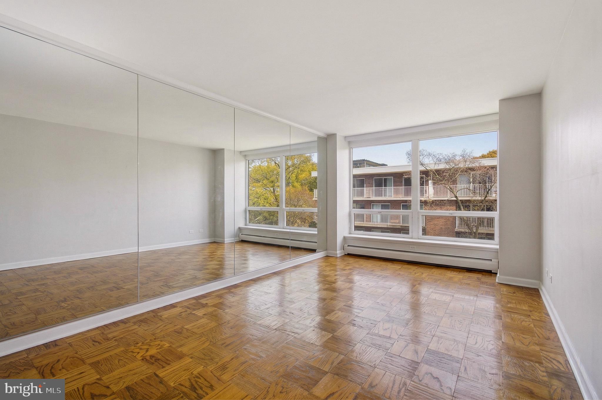 400 O Street Southwest, Unit 402 Washington, DC 20024 - Photo 4 of 34 a view of an empty room with a window