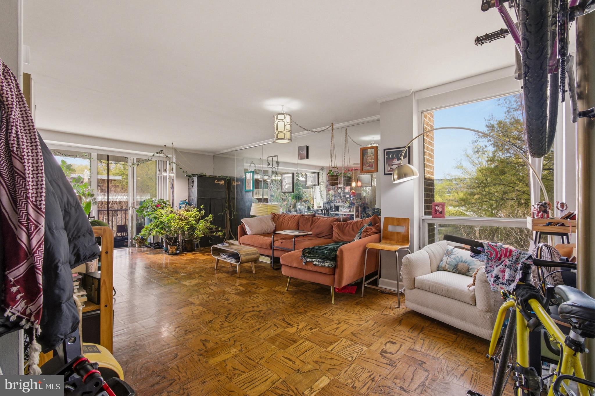 400 O Street Southwest, Unit 402 Washington, DC 20024 - Photo 7 of 34 a living room with furniture and a flat screen tv