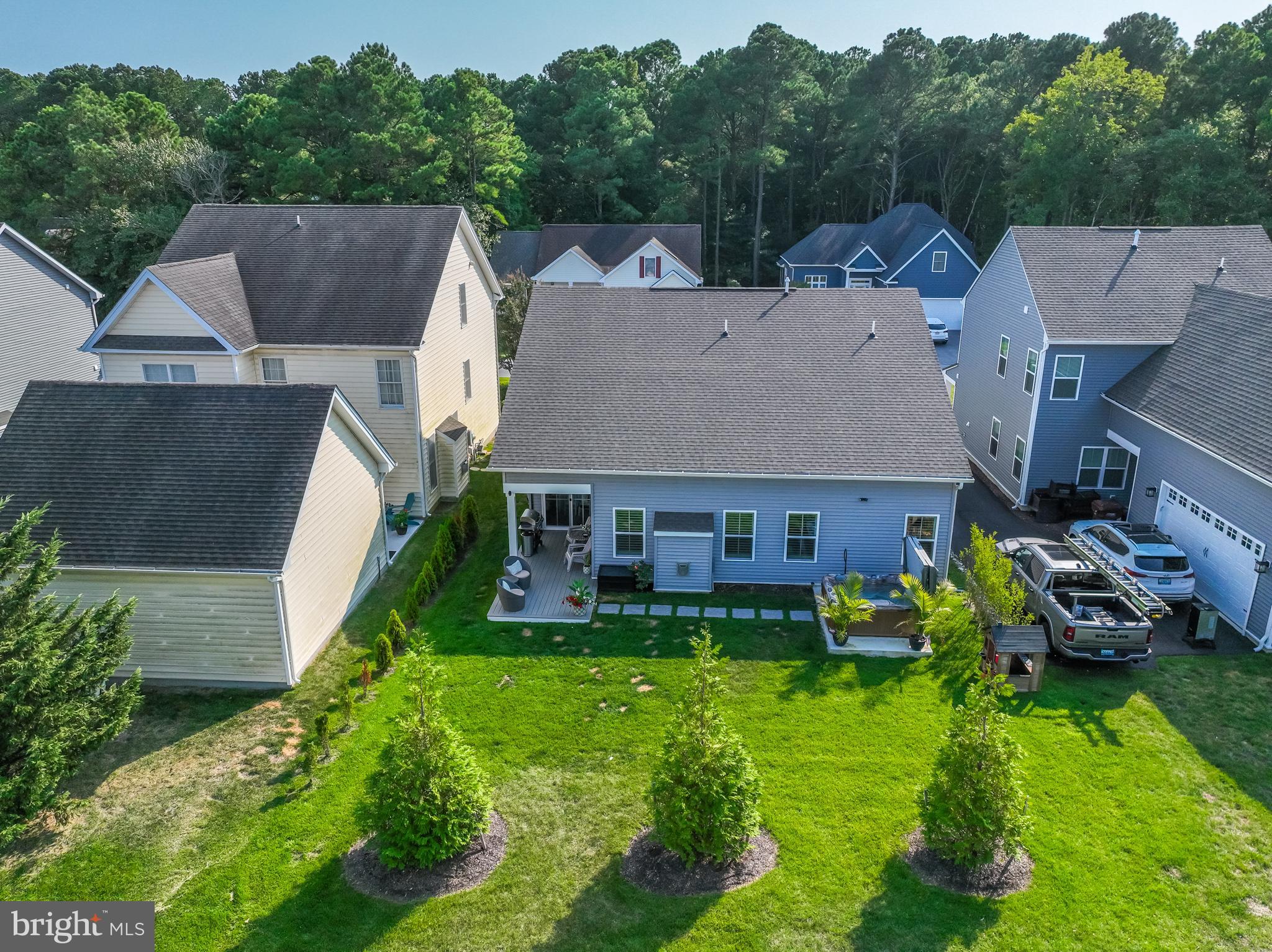 12125 Snug Harbor Road Berlin, MD 21811 - Photo 11 of 52 an aerial view of a house with a big yard and large trees
