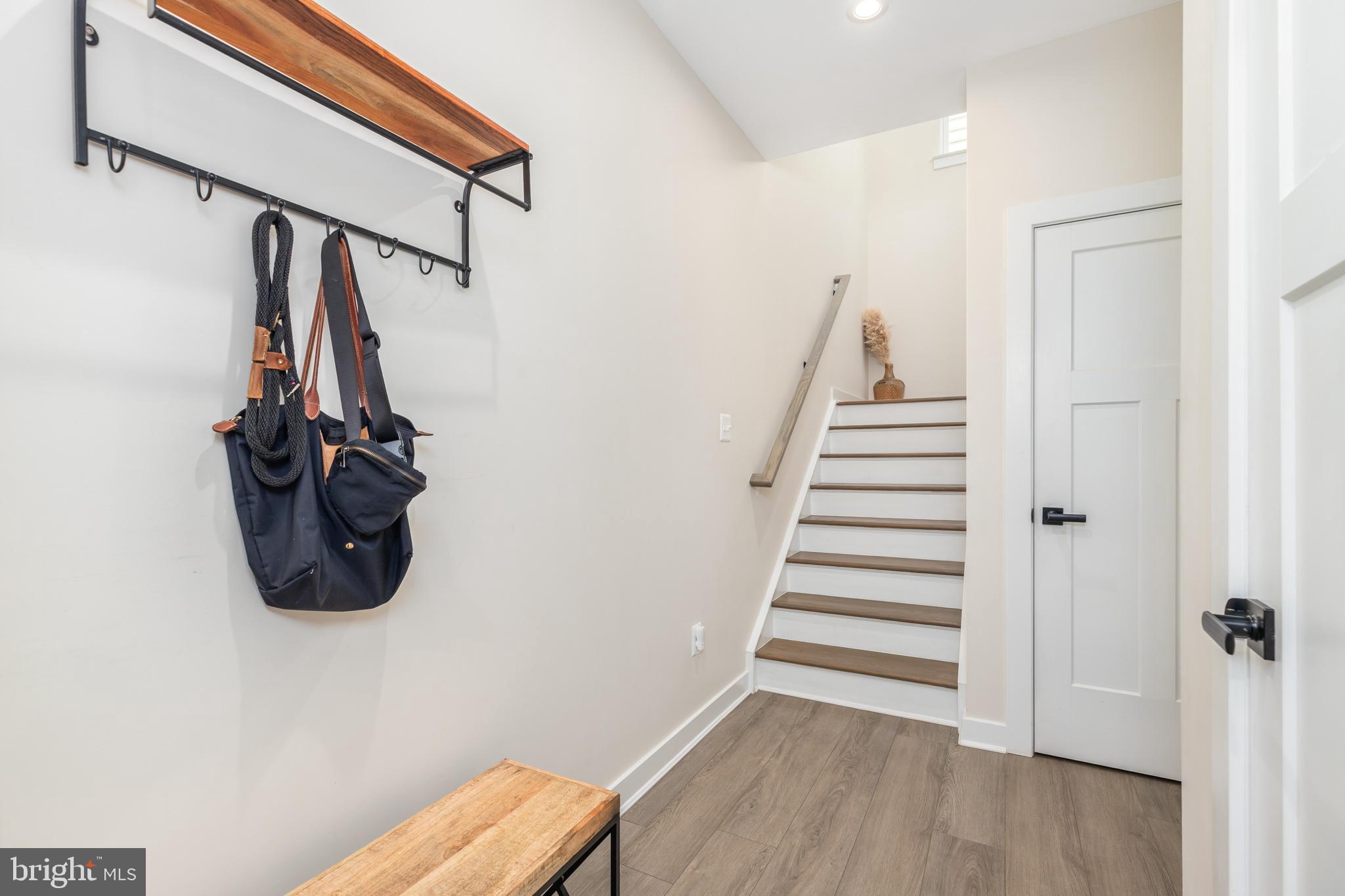 12125 Snug Harbor Road Berlin, MD 21811 - Photo 15 of 52 a view of entryway and hall with wooden floor