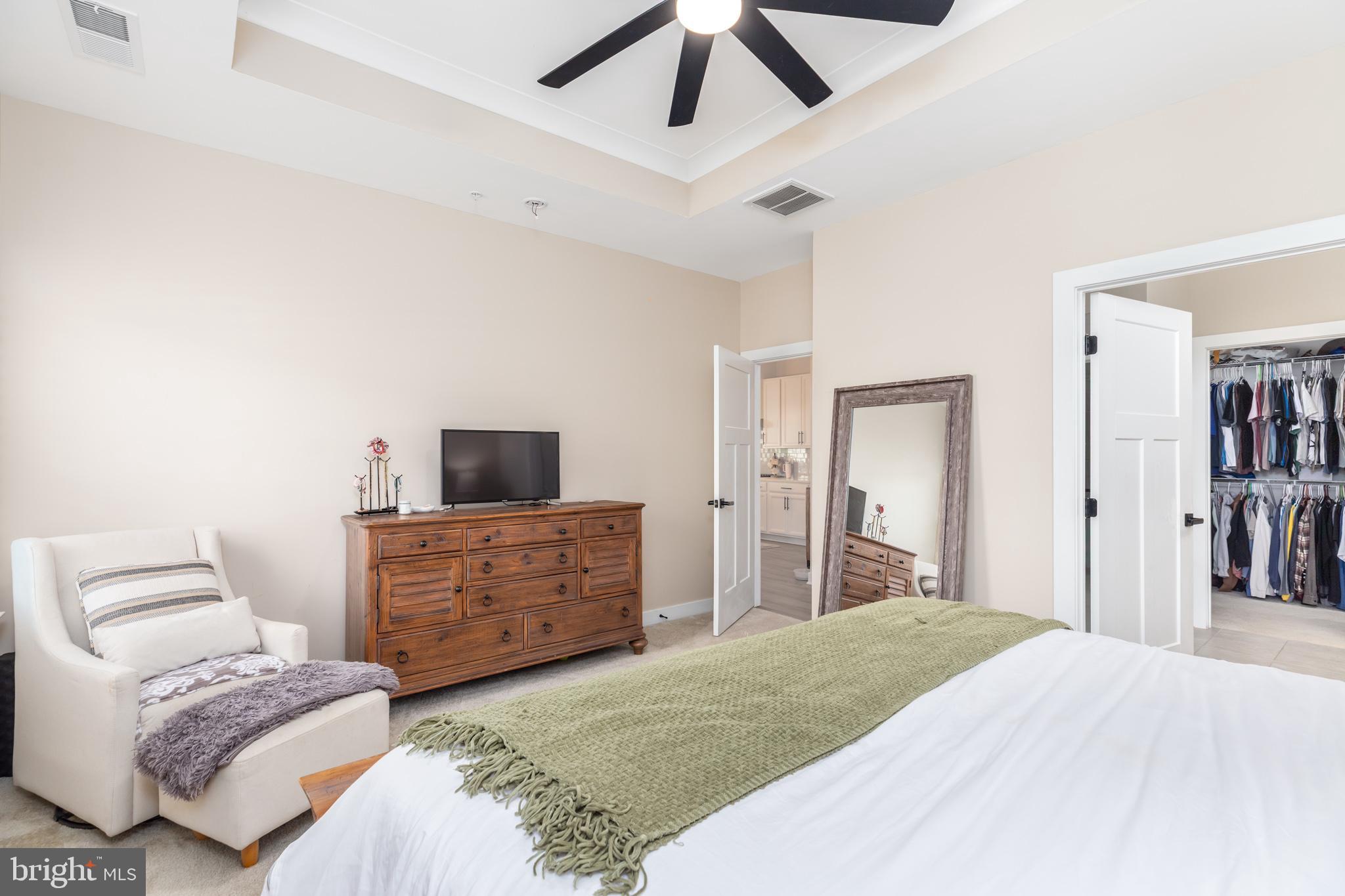 12125 Snug Harbor Road Berlin, MD 21811 - Photo 34 of 52 a bedroom with a bed and a television