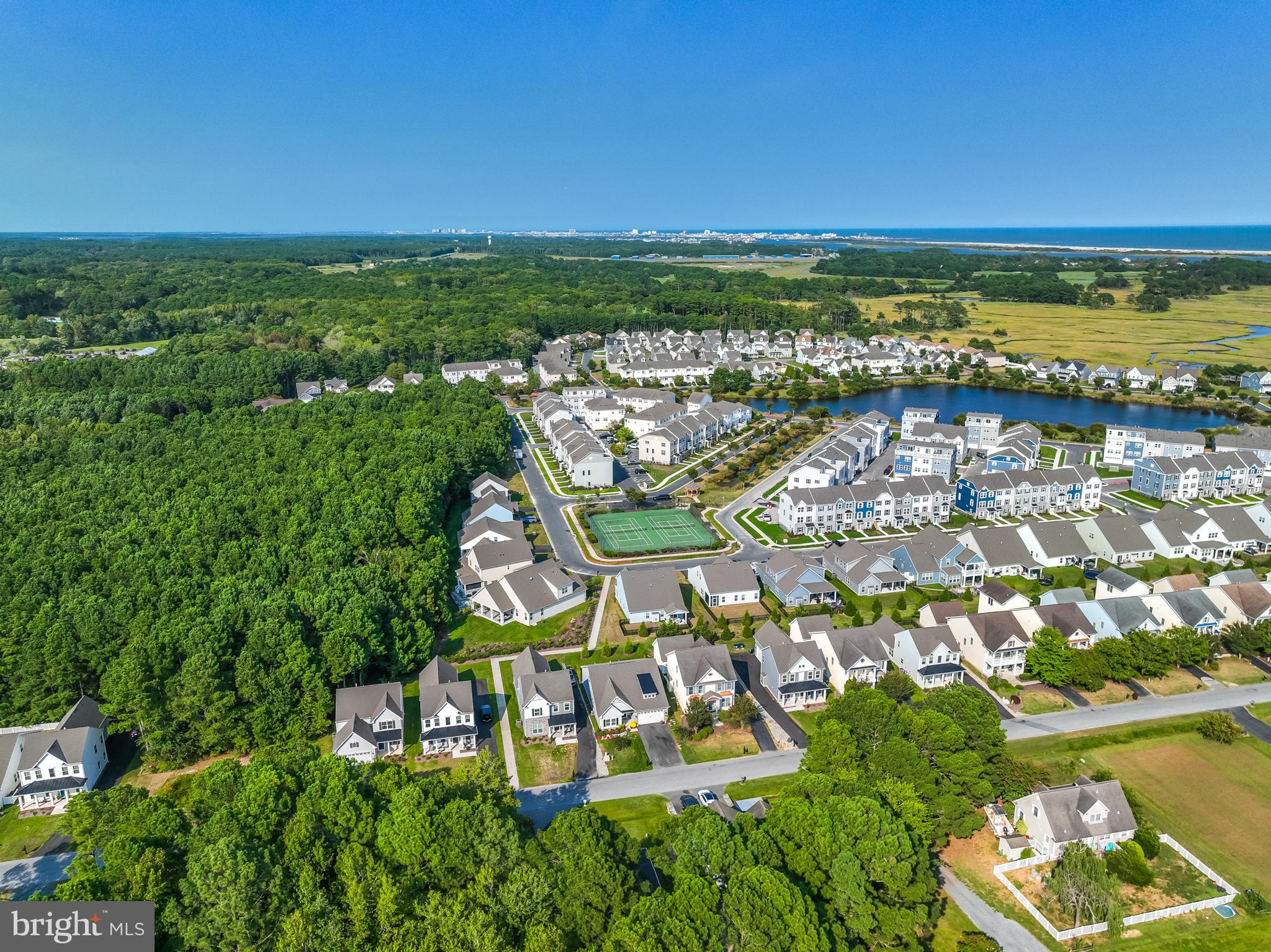 12125 Snug Harbor Road Berlin, MD 21811 - Photo 50 of 52 an aerial view of residential building and lake