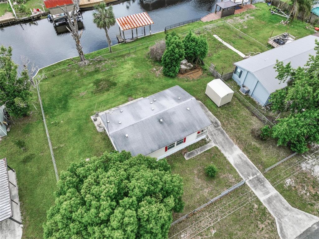 55716 Keith Street Astor, FL 32102 - Photo 3 of 32 an aerial view of a house