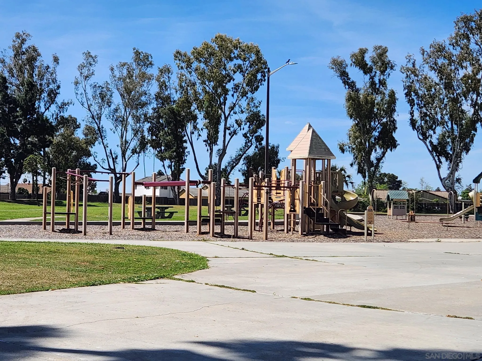 8667 Cetus Road San Diego, CA 92126 - Photo 21 of 22 a view of road with houses