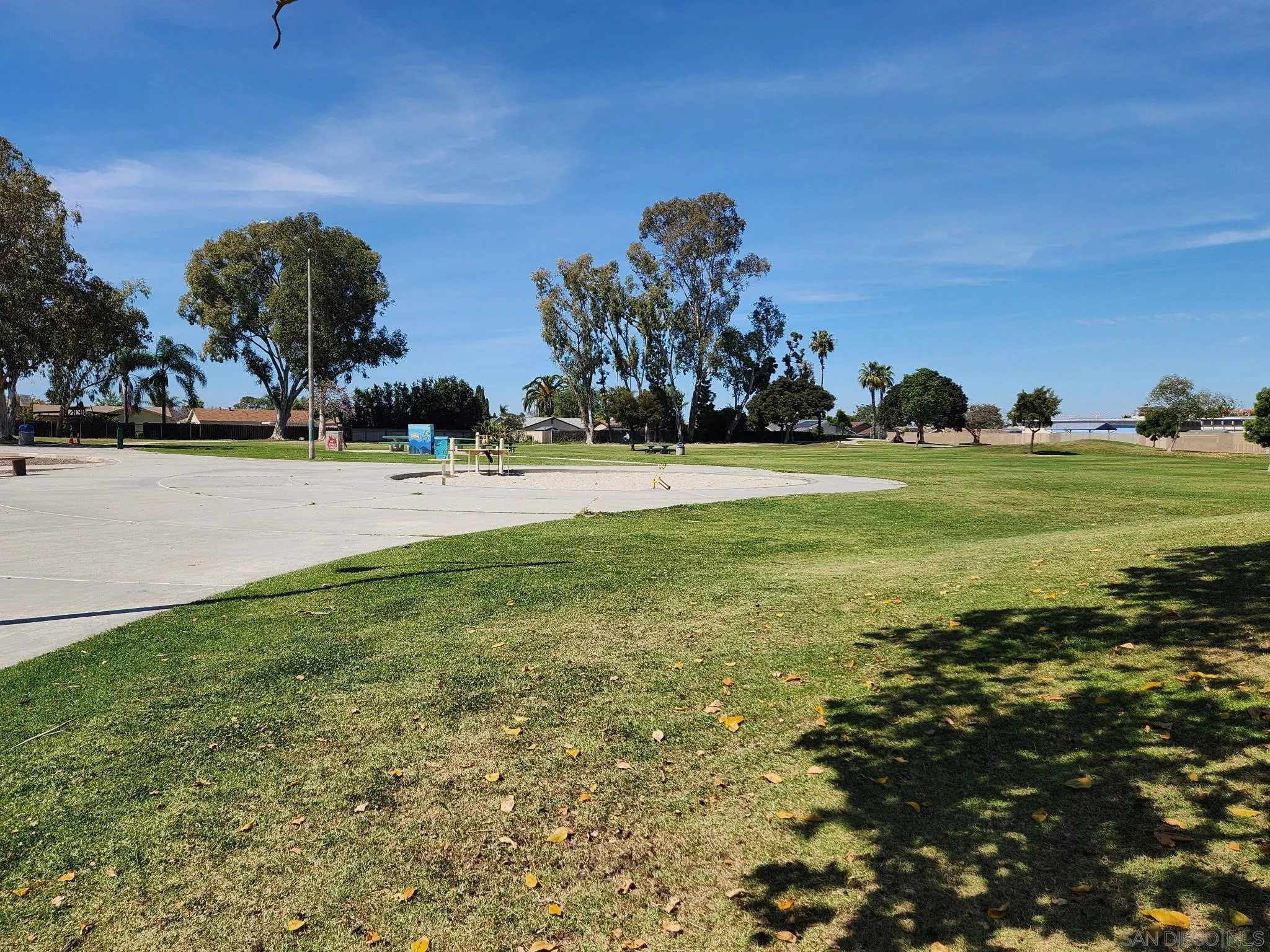 8667 Cetus Road San Diego, CA 92126 - Photo 22 of 22 a view of a golf course with an ocean
