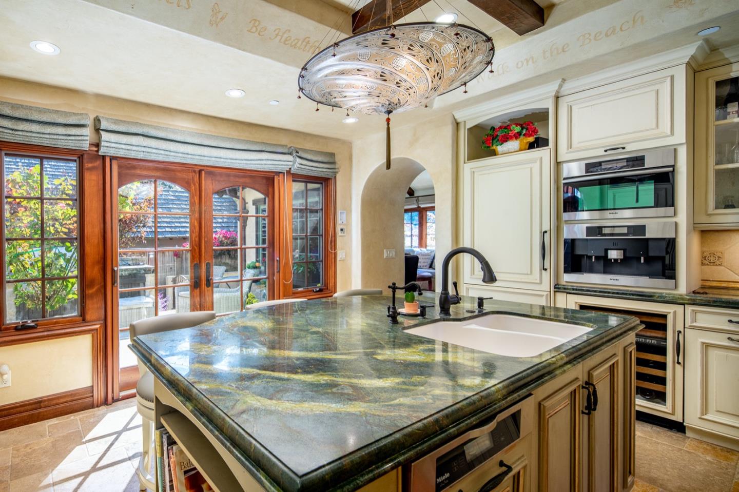 0 Casanova & 12th Corner Carmel, CA 93923 - Photo 11 of 30 a kitchen with stainless steel appliances granite countertop a stove and a sink