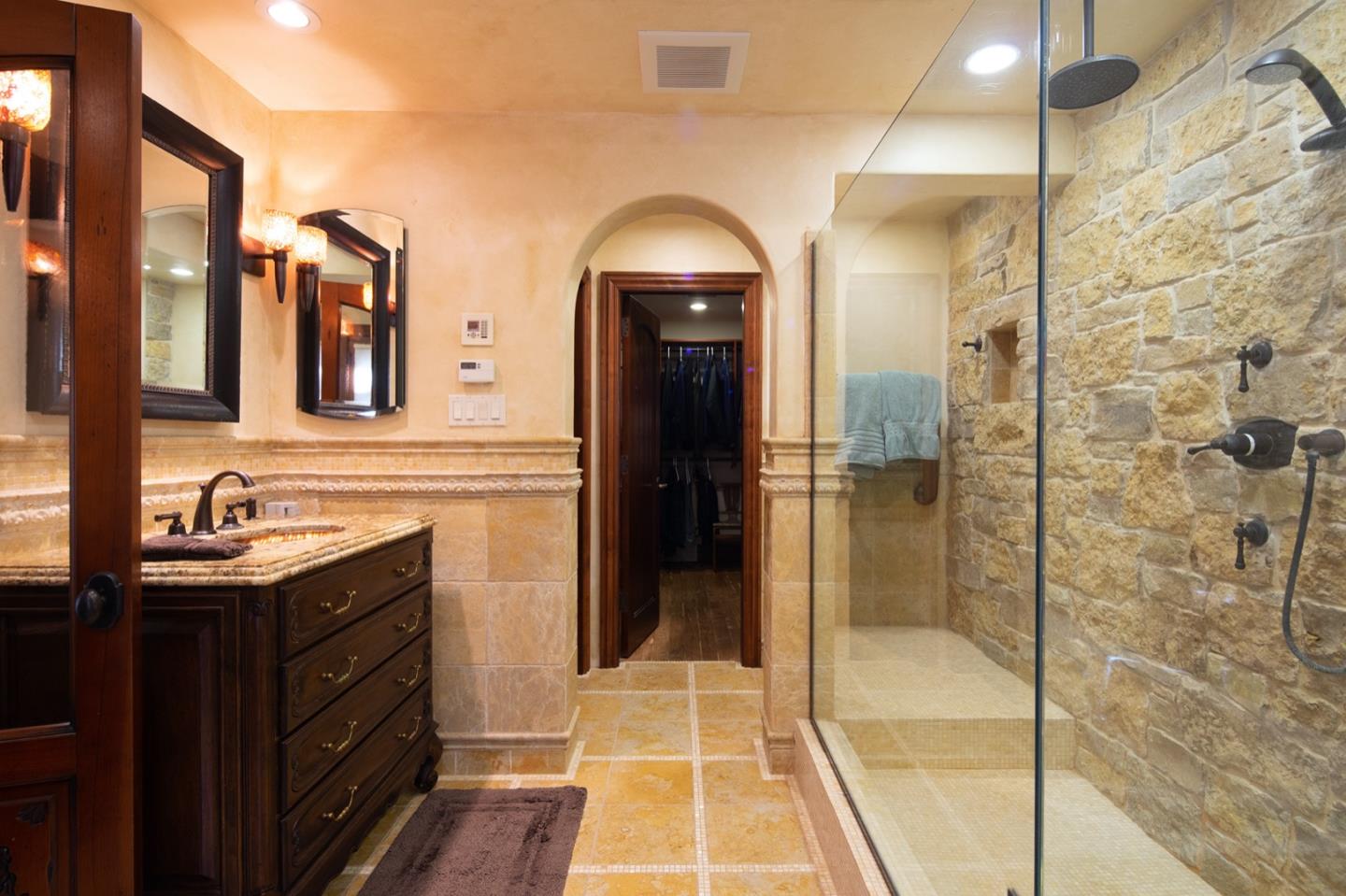 0 Casanova & 12th Corner Carmel, CA 93923 - Photo 17 of 30 a bathroom with a double vanity sink and a mirror