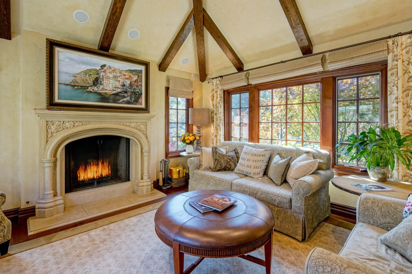 0 Casanova & 12th Corner Carmel, CA 93923 - Photo 3 of 30 a living room with furniture a fireplace and a floor to ceiling window