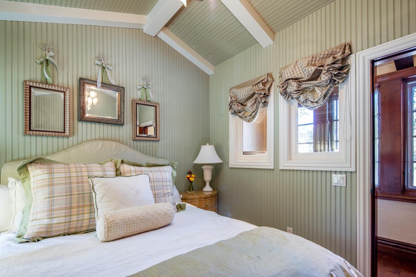 0 Casanova & 12th Corner Carmel, CA 93923 - Photo 22 of 30 a bedroom with a bed and wooden floor