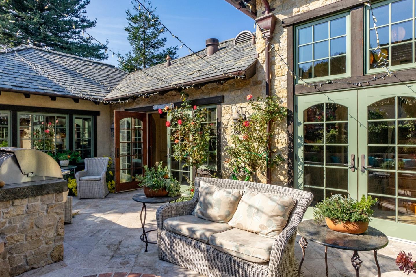 0 Casanova & 12th Corner Carmel, CA 93923 - Photo 27 of 30 a view of a patio with couches table and chairs and potted plants