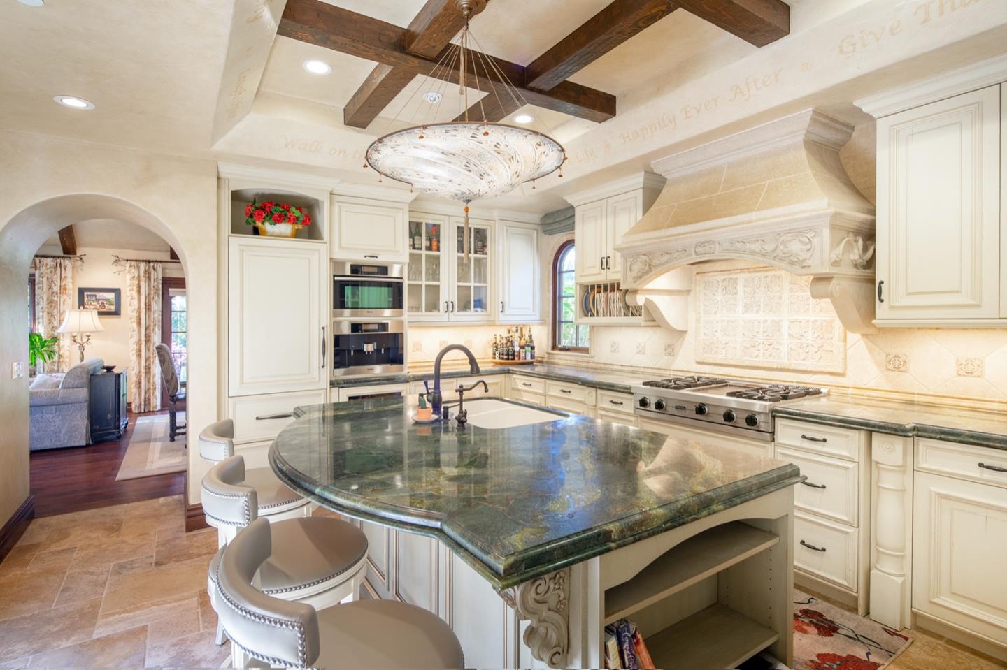 0 Casanova & 12th Corner Carmel, CA 93923 - Photo 7 of 30 a kitchen with a stove a sink dishwasher a dining table and chairs with wooden floor