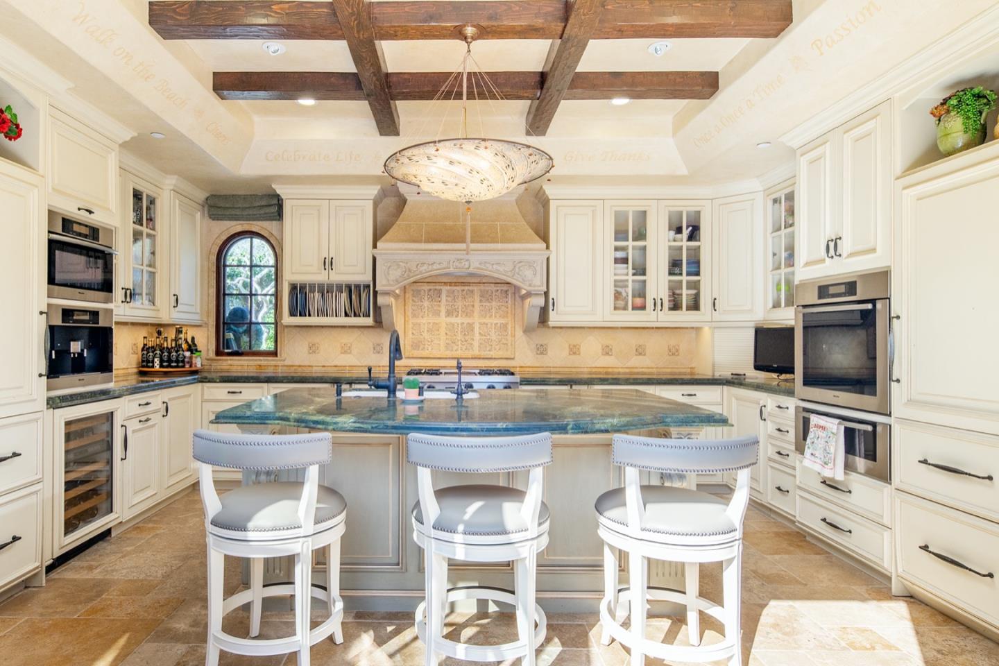 0 Casanova & 12th Corner Carmel, CA 93923 - Photo 9 of 30 a kitchen with stainless steel appliances granite countertop a stove and cabinets