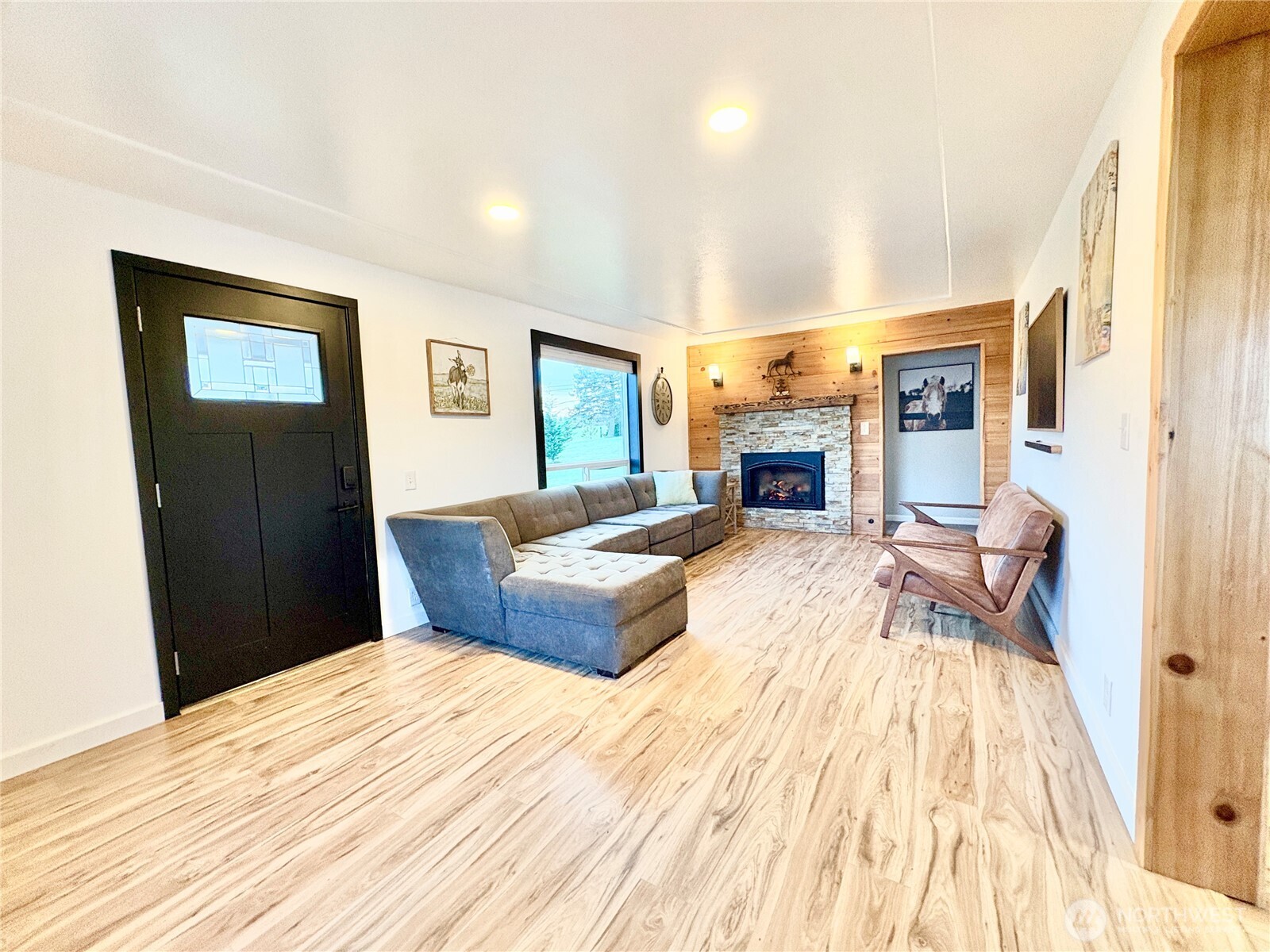 2452 Aldergrove Road Ferndale, WA 98248 - Photo 17 of 37 a bedroom with a bed and a fireplace