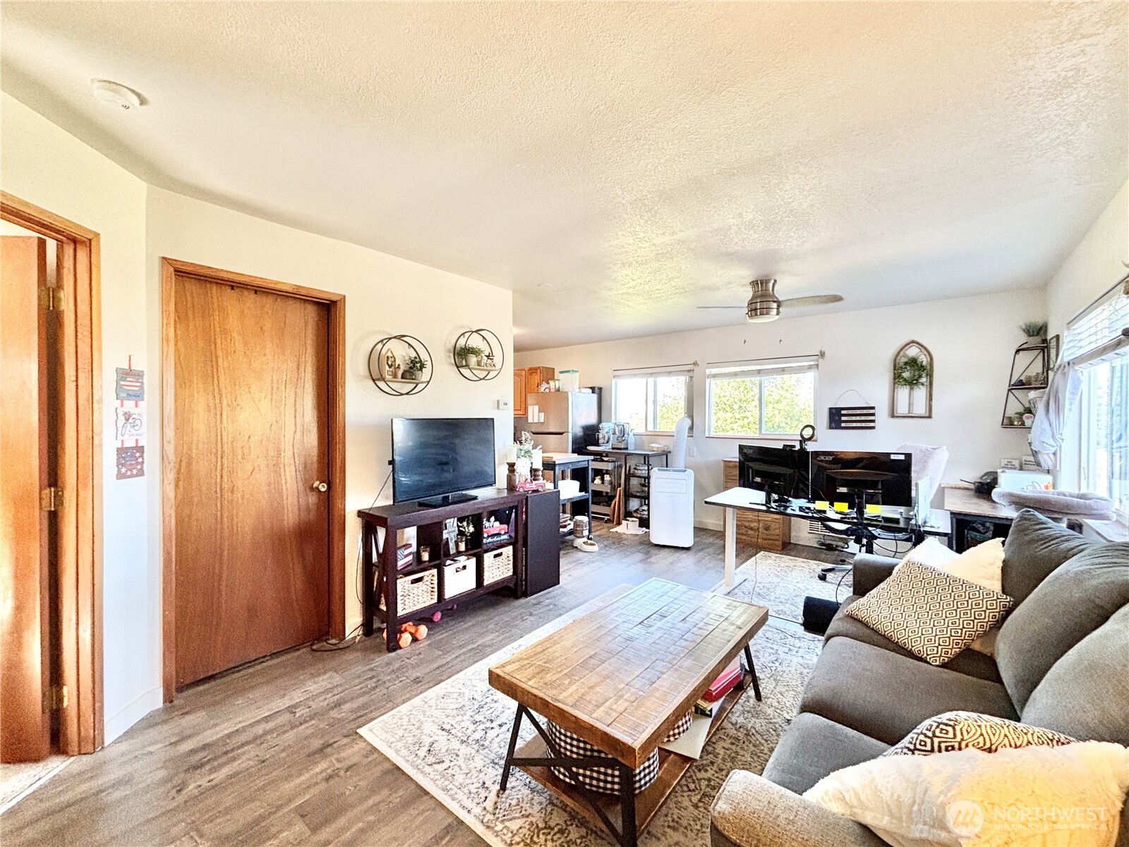 2452 Aldergrove Road Ferndale, WA 98248 - Photo 33 of 37 a living room with furniture and wooden floor