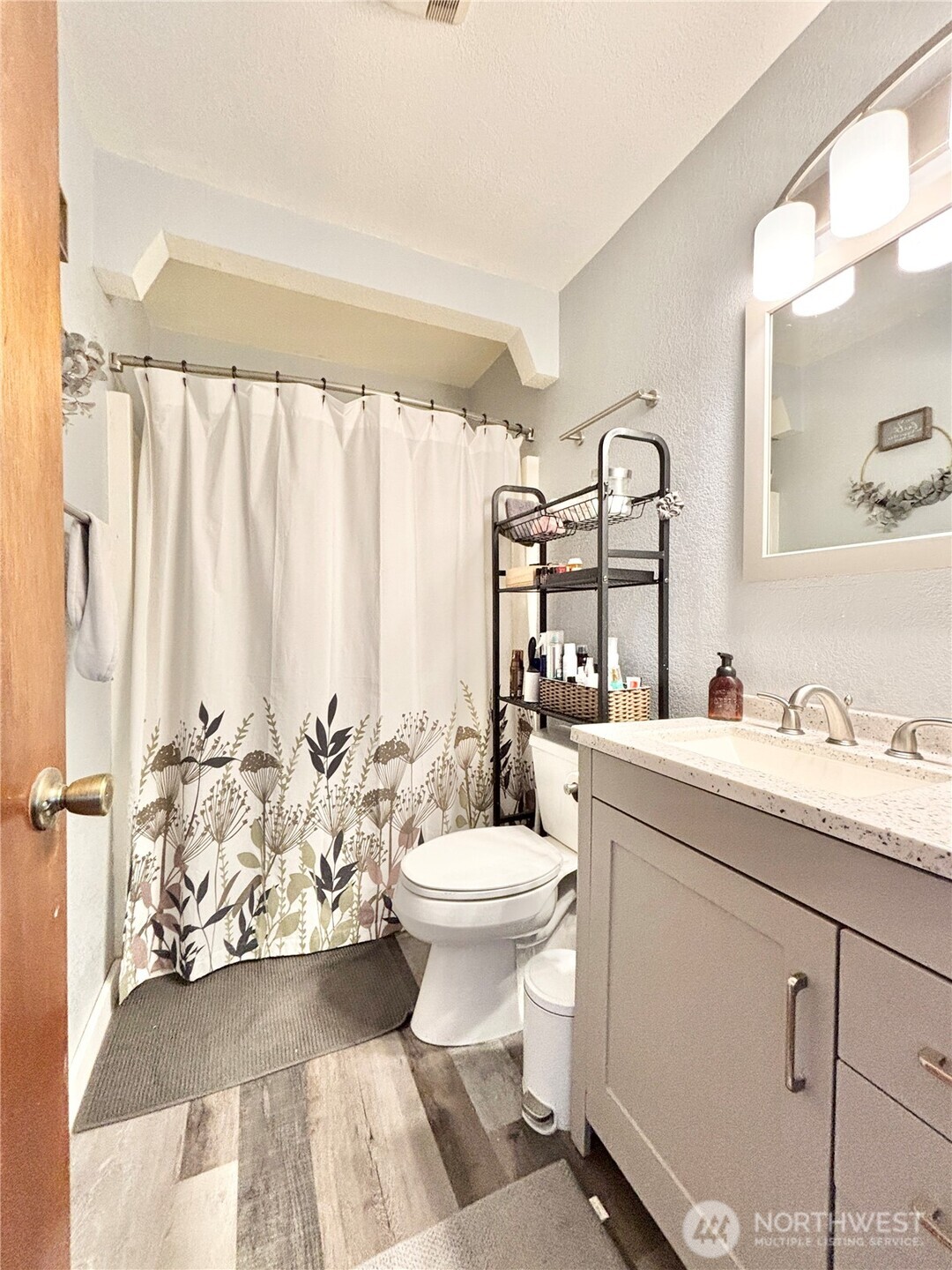 2452 Aldergrove Road Ferndale, WA 98248 - Photo 36 of 37 a bathroom with a toilet sink and mirror