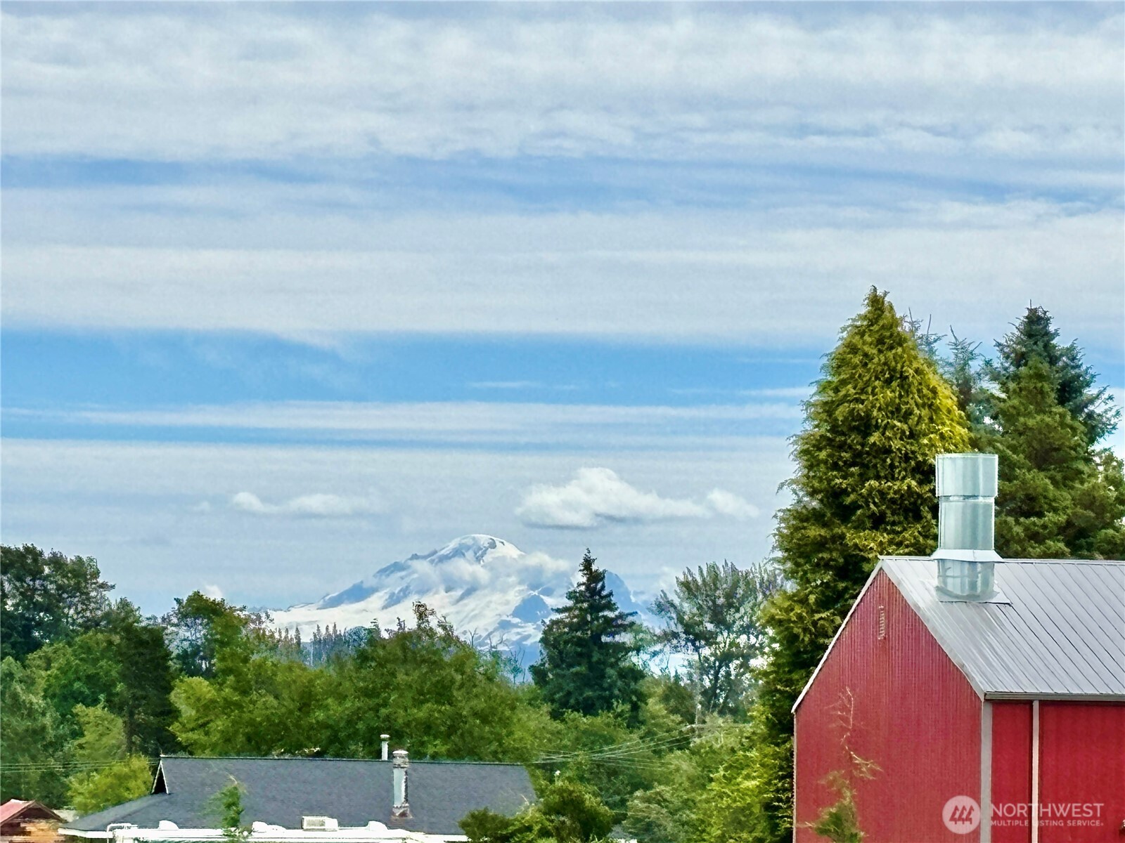 2452 Aldergrove Road Ferndale, WA 98248 - Photo 37 of 37 a view of a lake with a yard