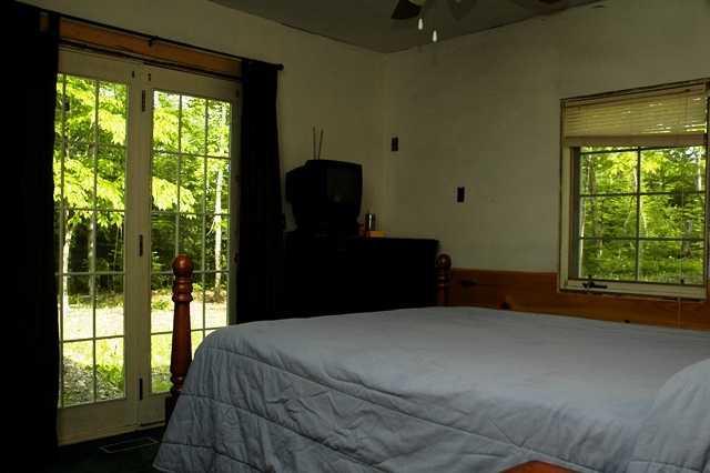 201 Canada Rd Forks West Forks, ME 04985 - Photo 5 of 14 Master Bedroom. Master bedroom with...