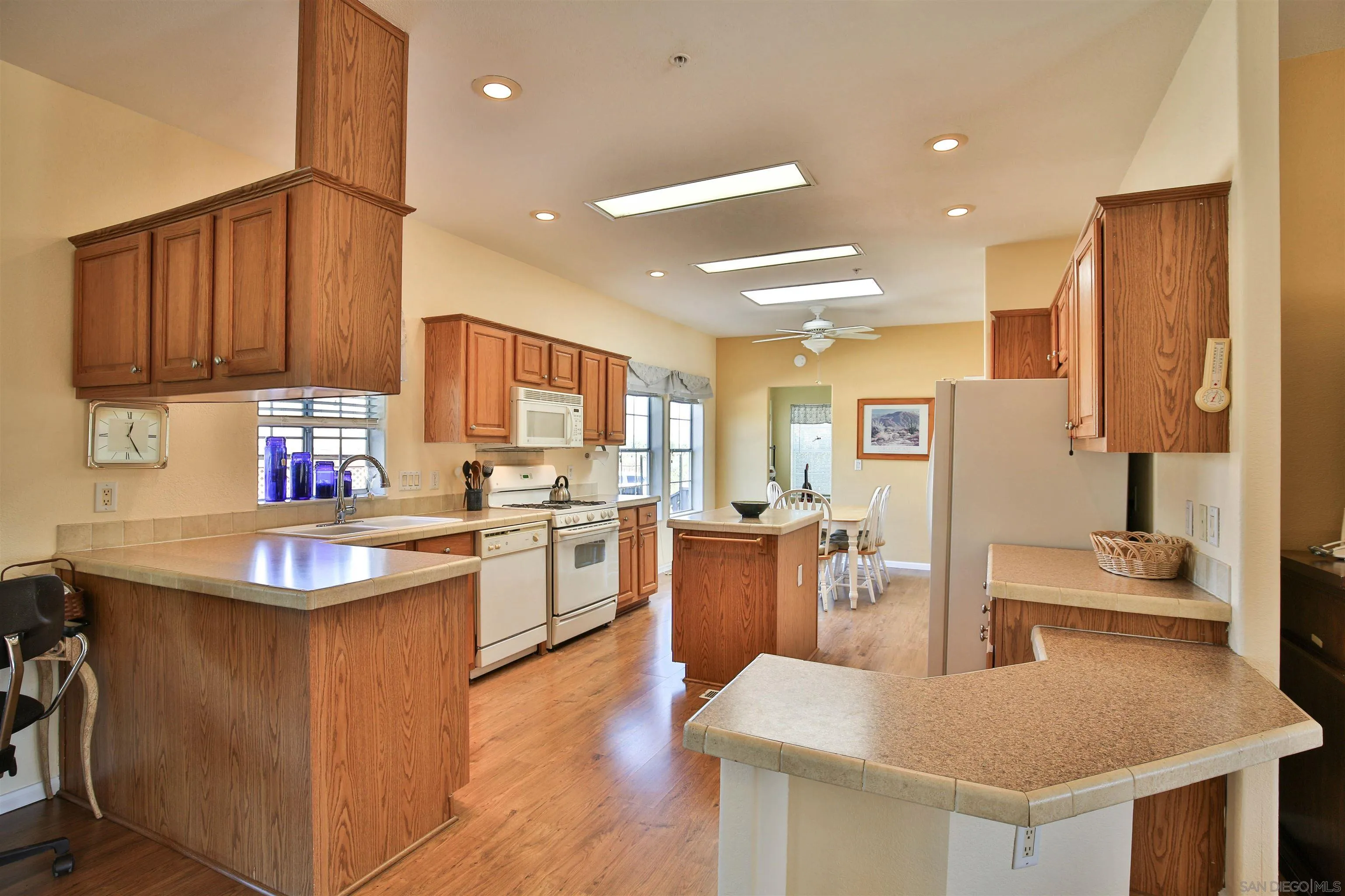 2846 Frying Pan Road Borrego Springs, CA 92004 - Photo 11 of 27 a kitchen with kitchen island granite countertop a sink counter top space and appliances