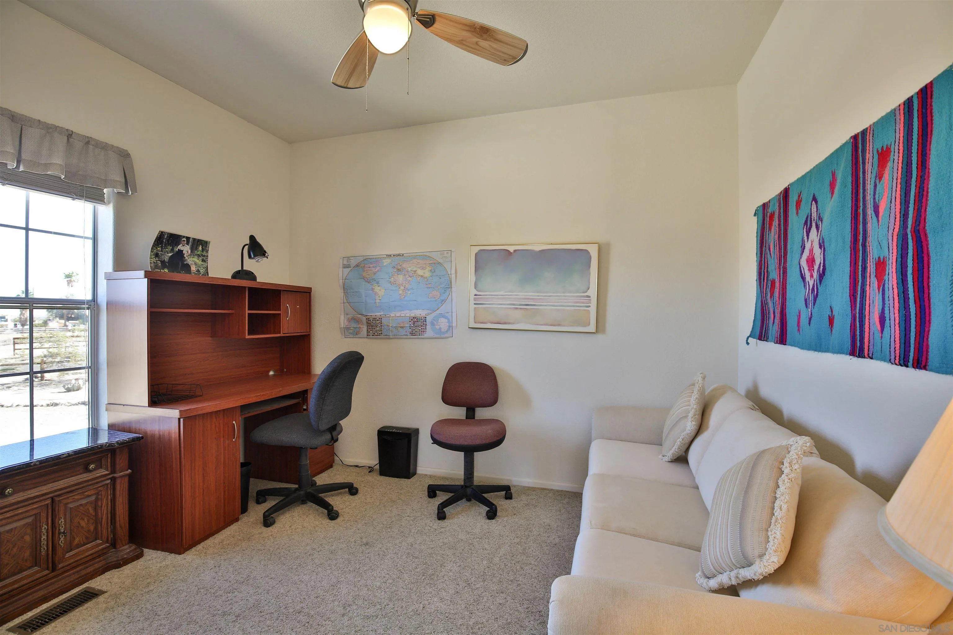 2846 Frying Pan Road Borrego Springs, CA 92004 - Photo 15 of 27 a living room with furniture and a window