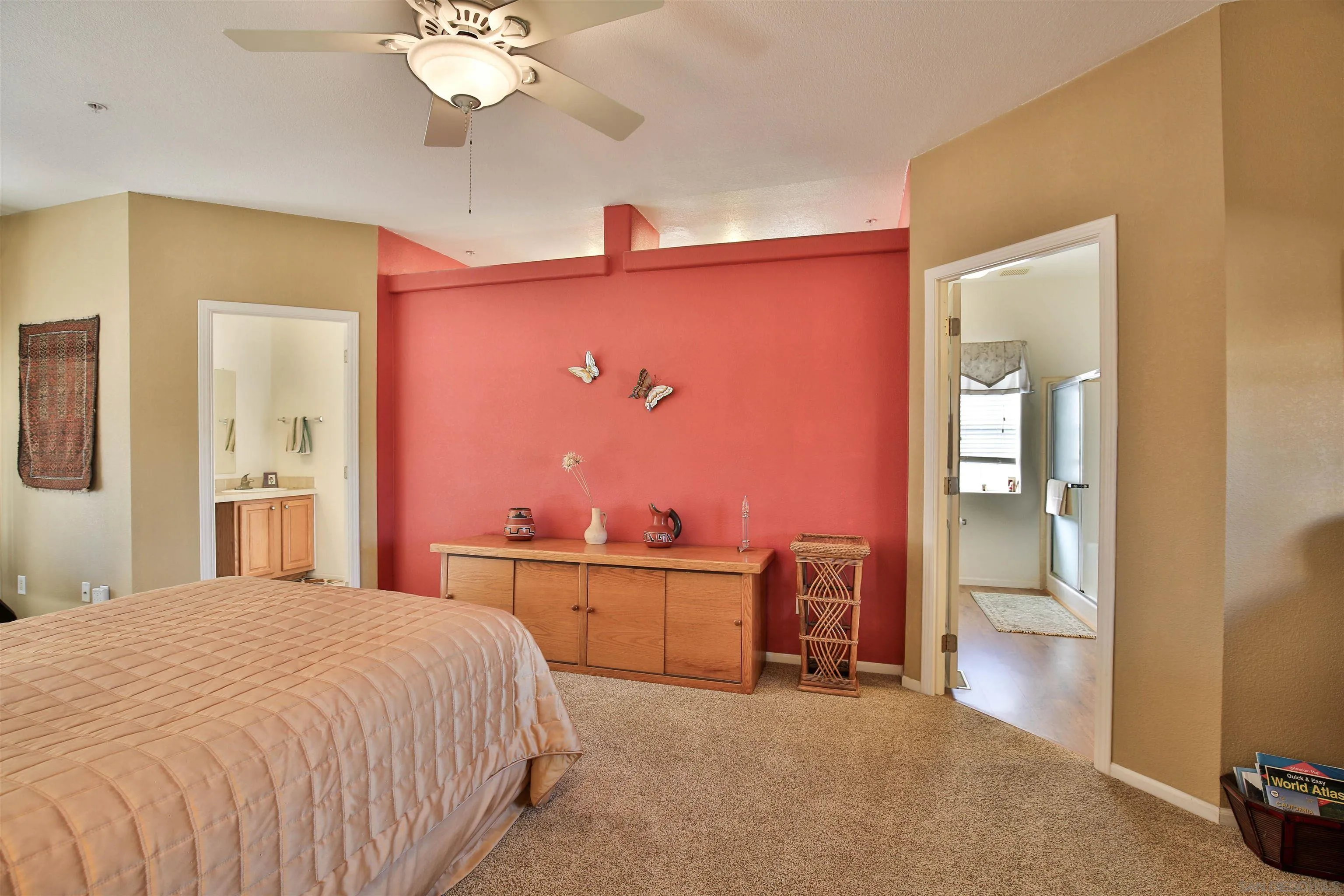 2846 Frying Pan Road Borrego Springs, CA 92004 - Photo 18 of 27 a spacious bedroom with a bed and a chandelier