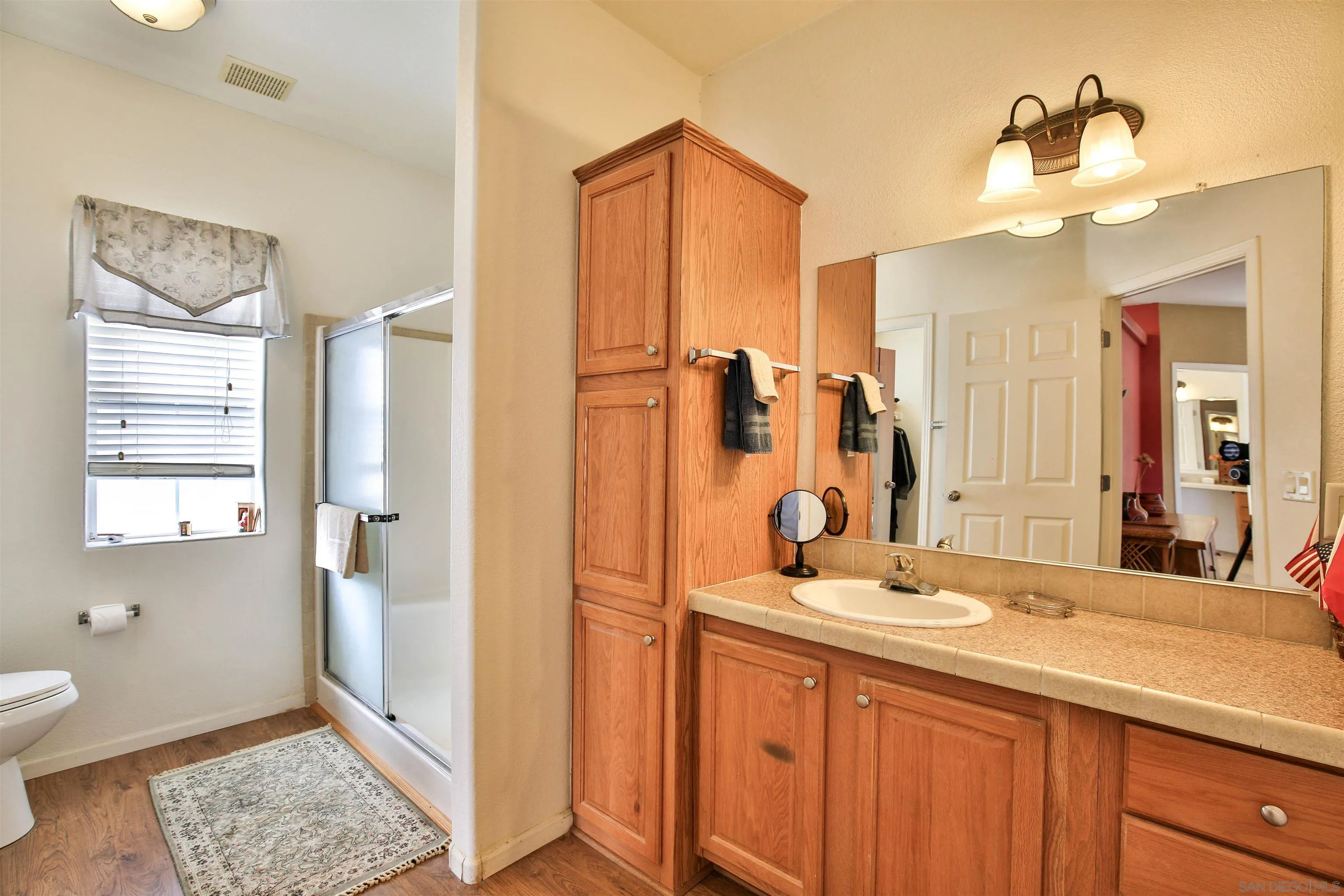 2846 Frying Pan Road Borrego Springs, CA 92004 - Photo 19 of 27 a bathroom with a double vanity sink mirror and double
