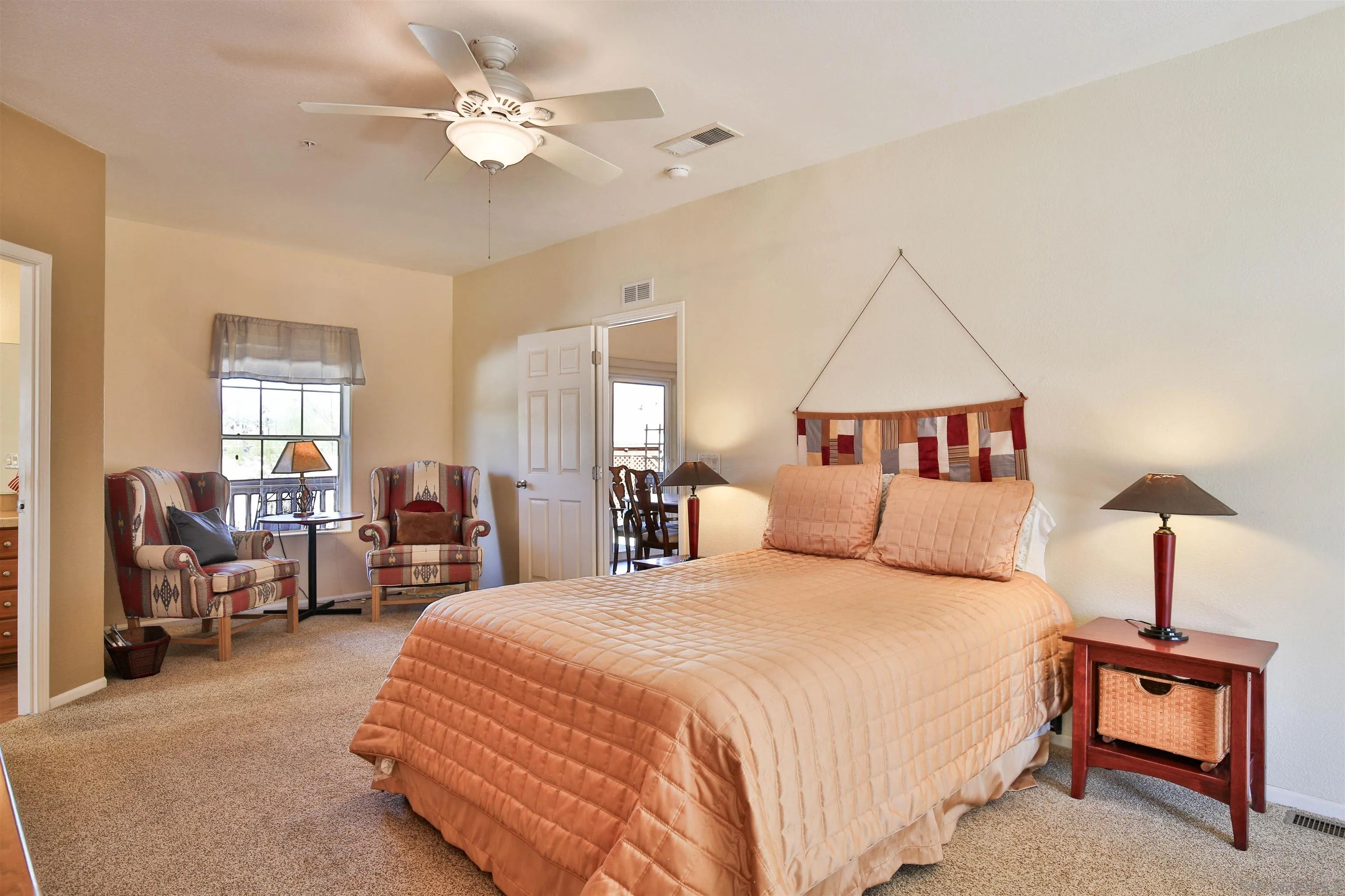 2846 Frying Pan Road Borrego Springs, CA 92004 - Photo 23 of 27 a bedroom with a bed and a chandelier