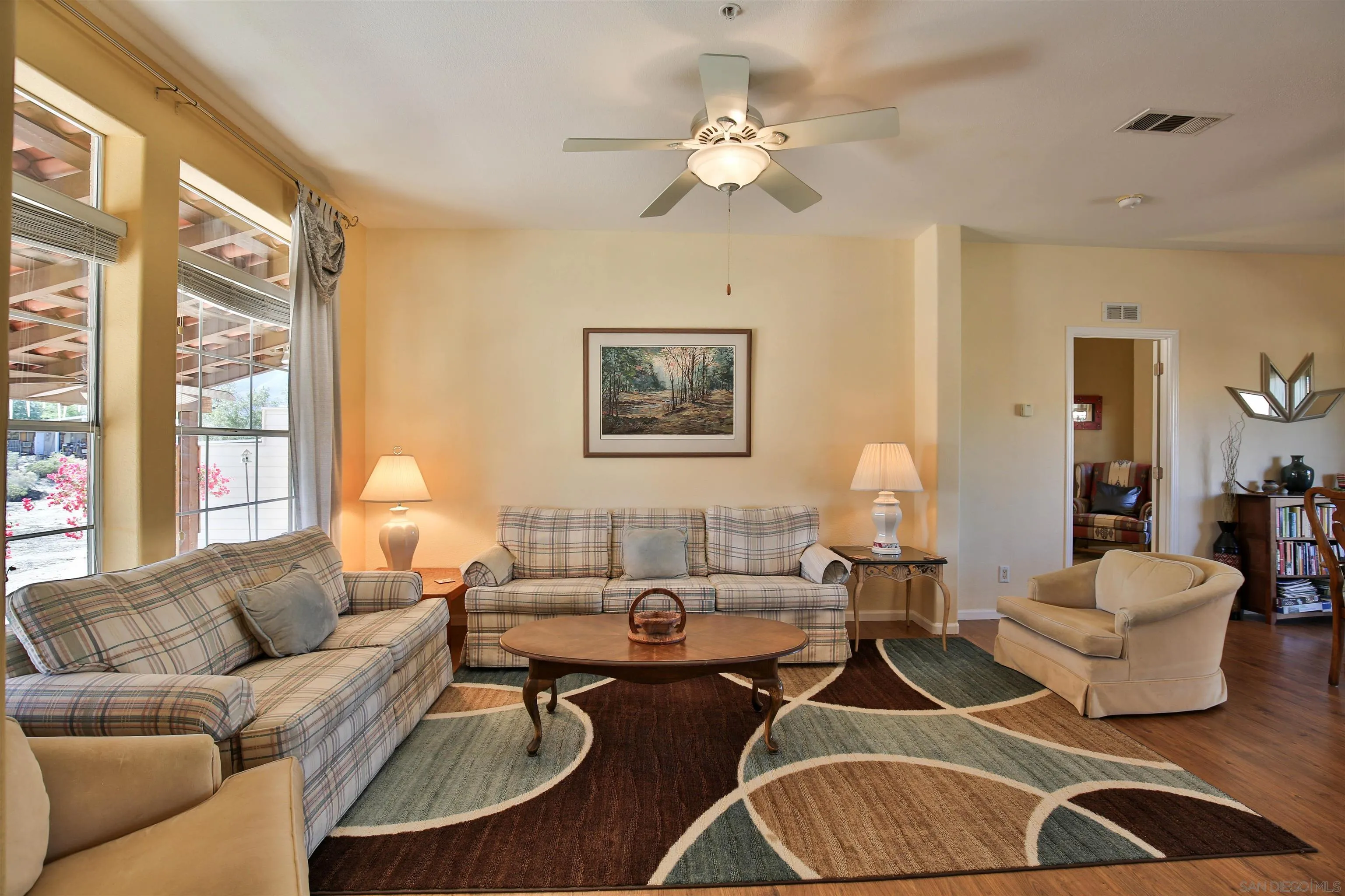 2846 Frying Pan Road Borrego Springs, CA 92004 - Photo 6 of 27 a living room with furniture potted plant and a window