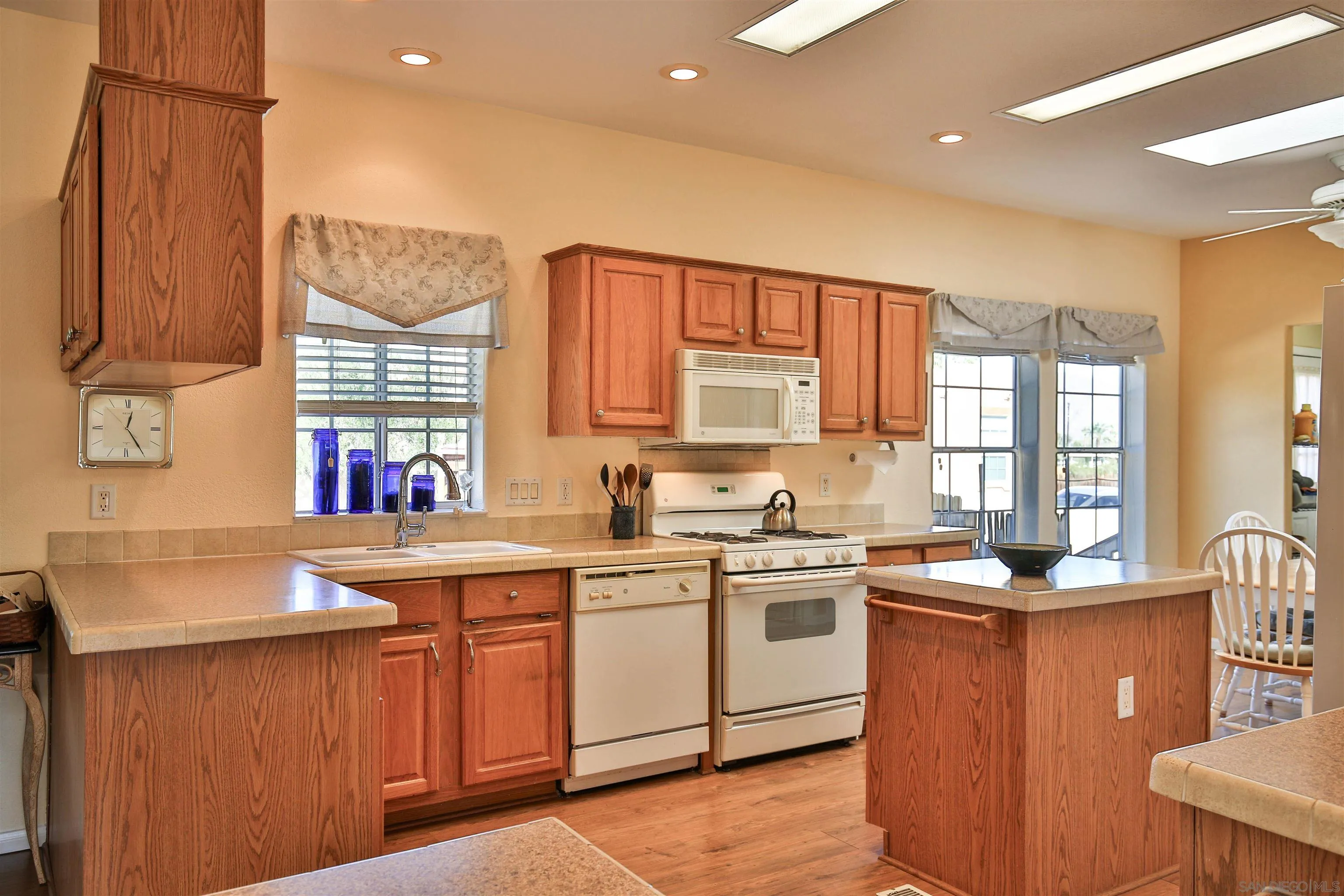 2846 Frying Pan Road Borrego Springs, CA 92004 - Photo 10 of 27 a kitchen with a sink stove and cabinets