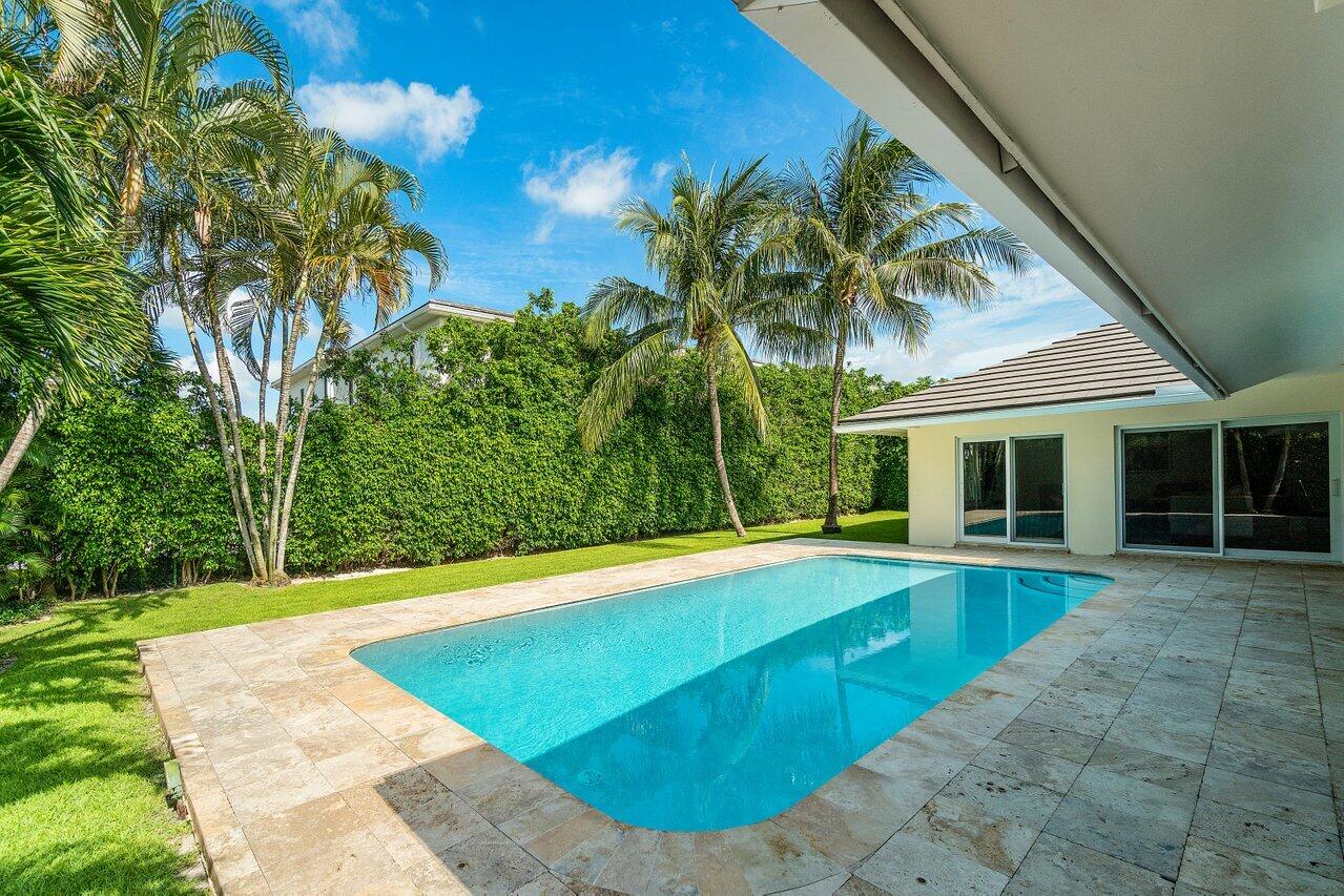 2377 East Silver Palm Road Boca Raton, FL 33432 - Photo 32 of 40 a view of an house with swimming pool and sitting area