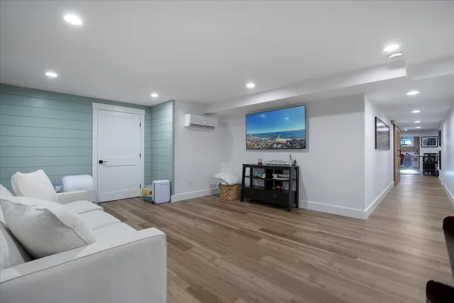 a bathroom with a sink mirror and vanity