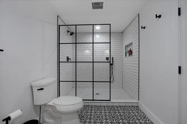 a media room with lots of chairs and a projector screen