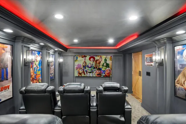 a living room with lots of furniture and a wooden floor