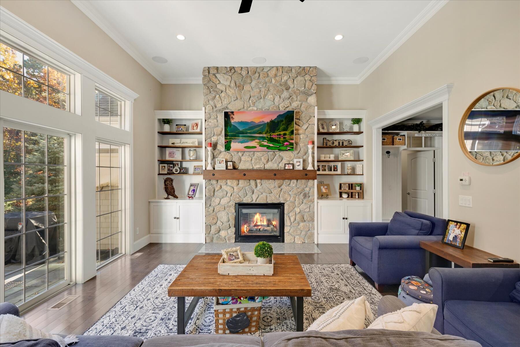 35 Spinnaker Drive West Mashpee, MA 02649 - Photo 10 of 59 a living room with furniture and a fireplace