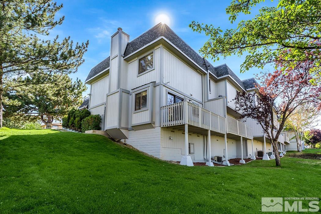 3943 Kings Row Reno, NV 89503 - Photo 1 of 16 a front view of a house with a yard