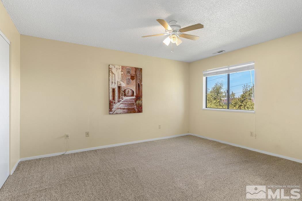 3943 Kings Row Reno, NV 89503 - Photo 15 of 16 an empty room with a painting on the wall