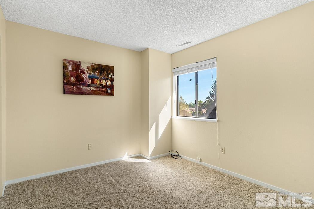 3943 Kings Row Reno, NV 89503 - Photo 16 of 16 an empty room with windows and closet