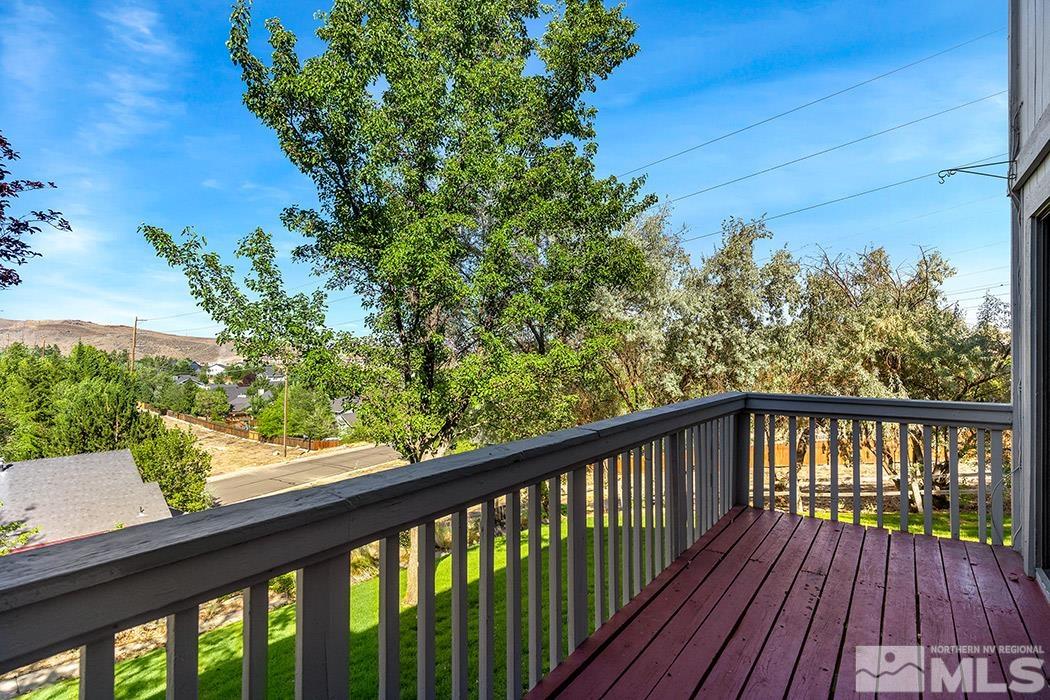 3943 Kings Row Reno, NV 89503 - Photo 5 of 16 a view of a balcony with wooden floor