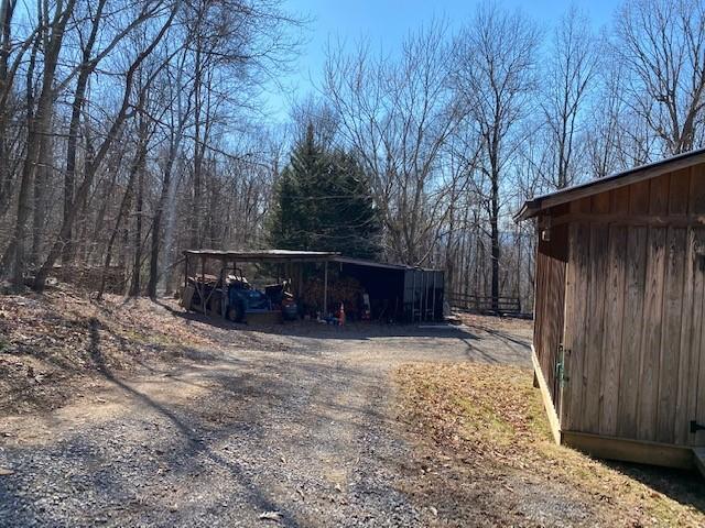 1200 Ditch Gap Road Whitwell, TN 37397 - Photo 22 of 28 Tractor, Wood Shed, Tool Storage