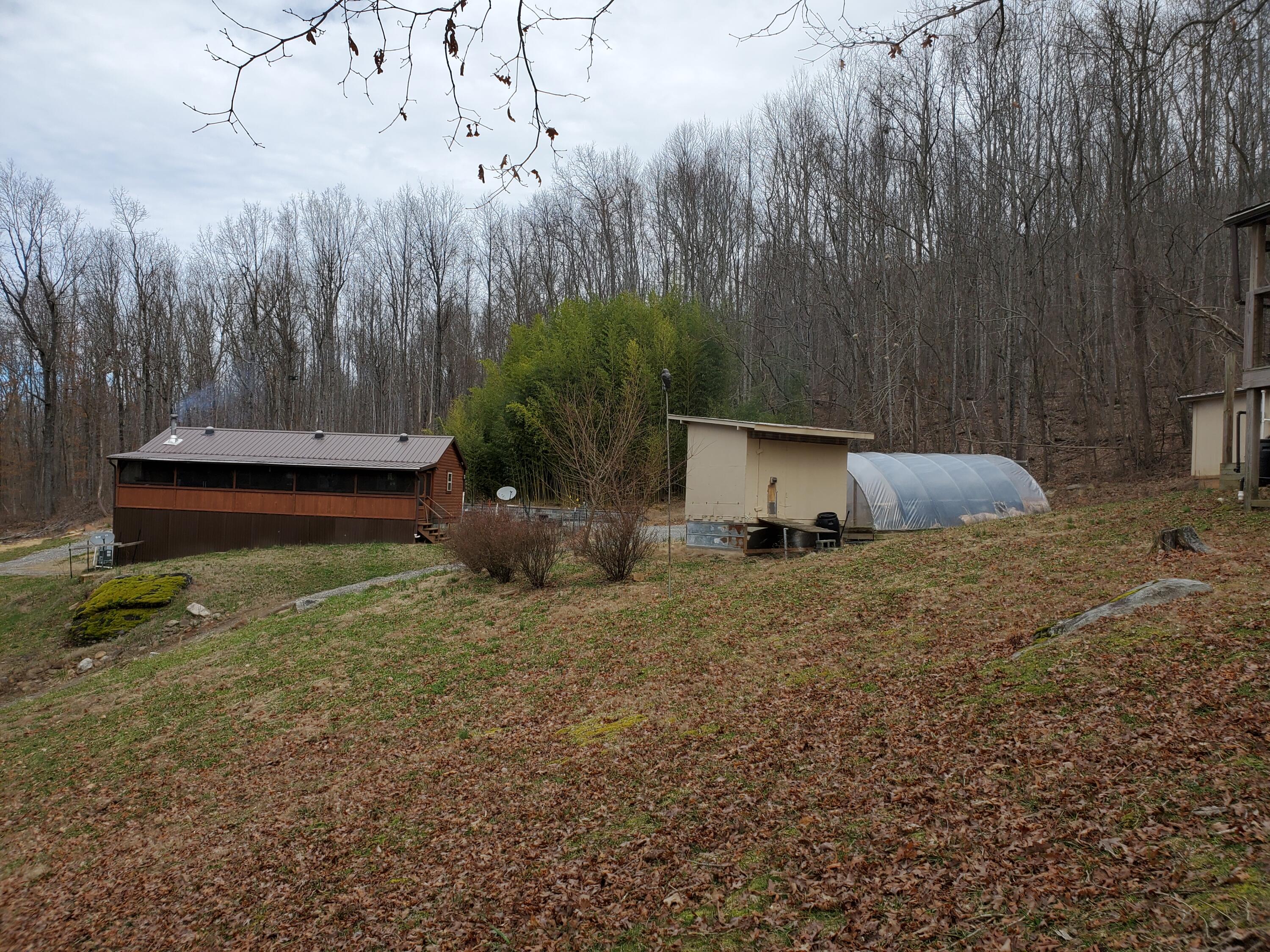 1200 Ditch Gap Road Whitwell, TN 37397 - Photo 23 of 28 Bearing Peach and Plum trees