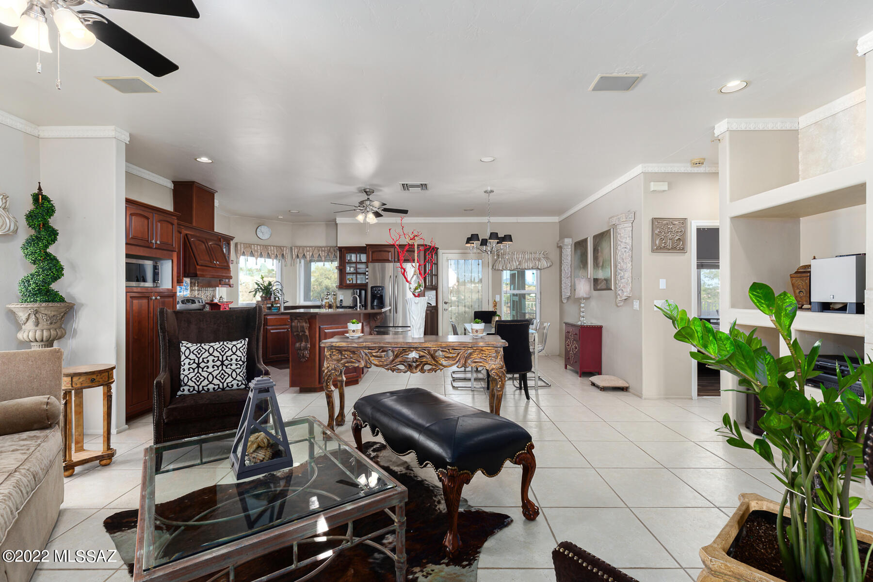 317 Valley View Drive Rio Rico, AZ 85648 - Photo 29 of 49 a view of a livingroom with furniture and a potted plant