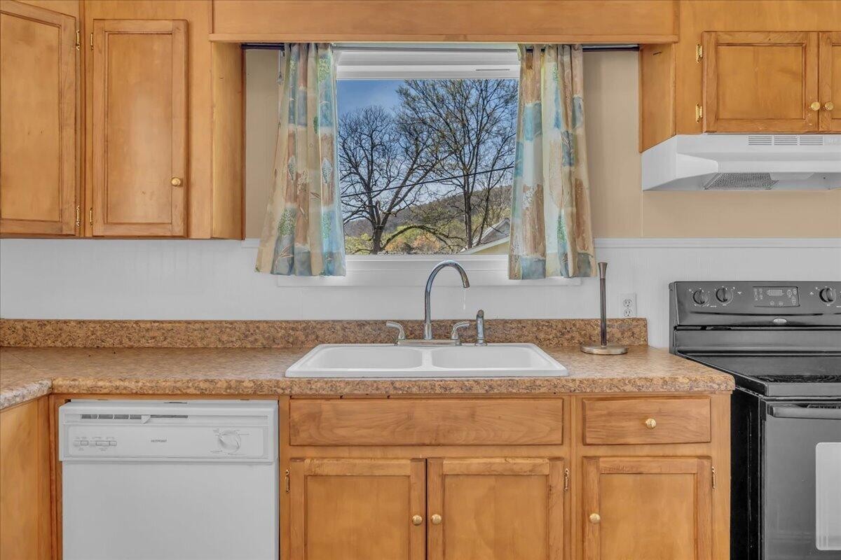 120 Raulstontown Road South Pittsburg, TN 37380 - Photo 11 of 22 a bathroom with a sink and a mirror